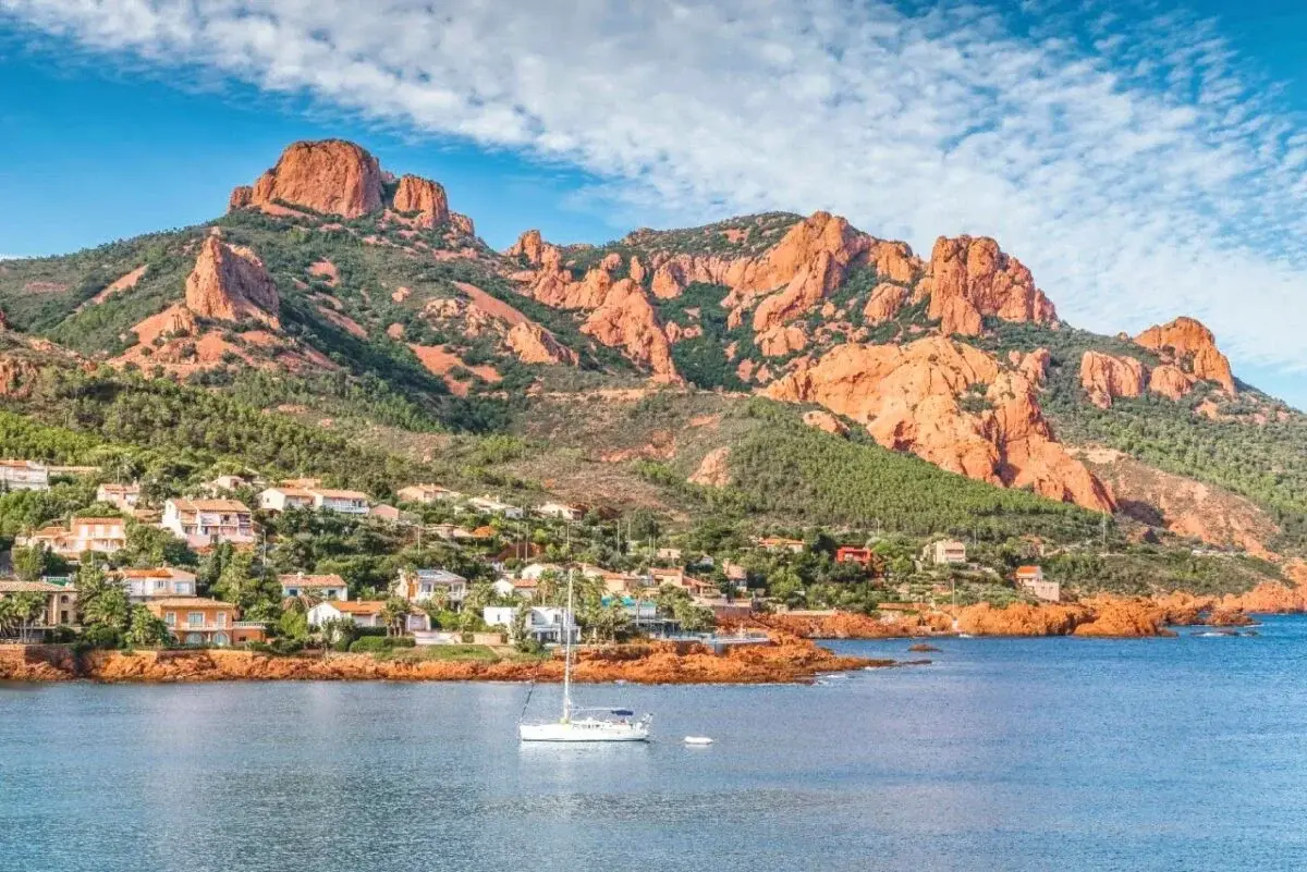 Red cliffs of the Esterel coastline near Cannes on the French Riviera at golden hour