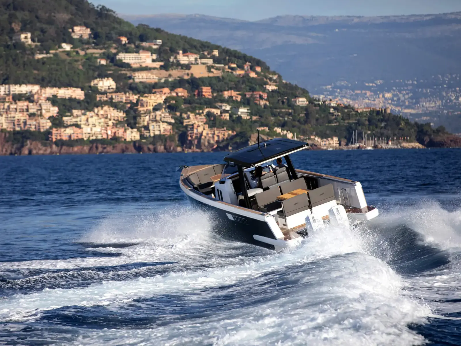 Fjord 38 Xpress day charter yacht cruising off Saint-Tropez on the French Riviera