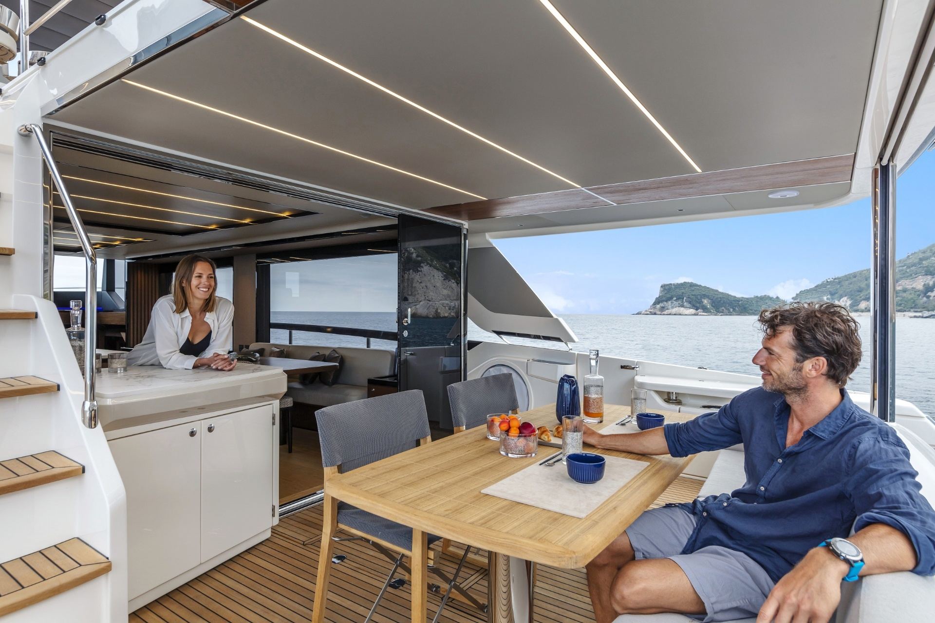 Couple enjoying breakfast on Absolute Navetta aft deck